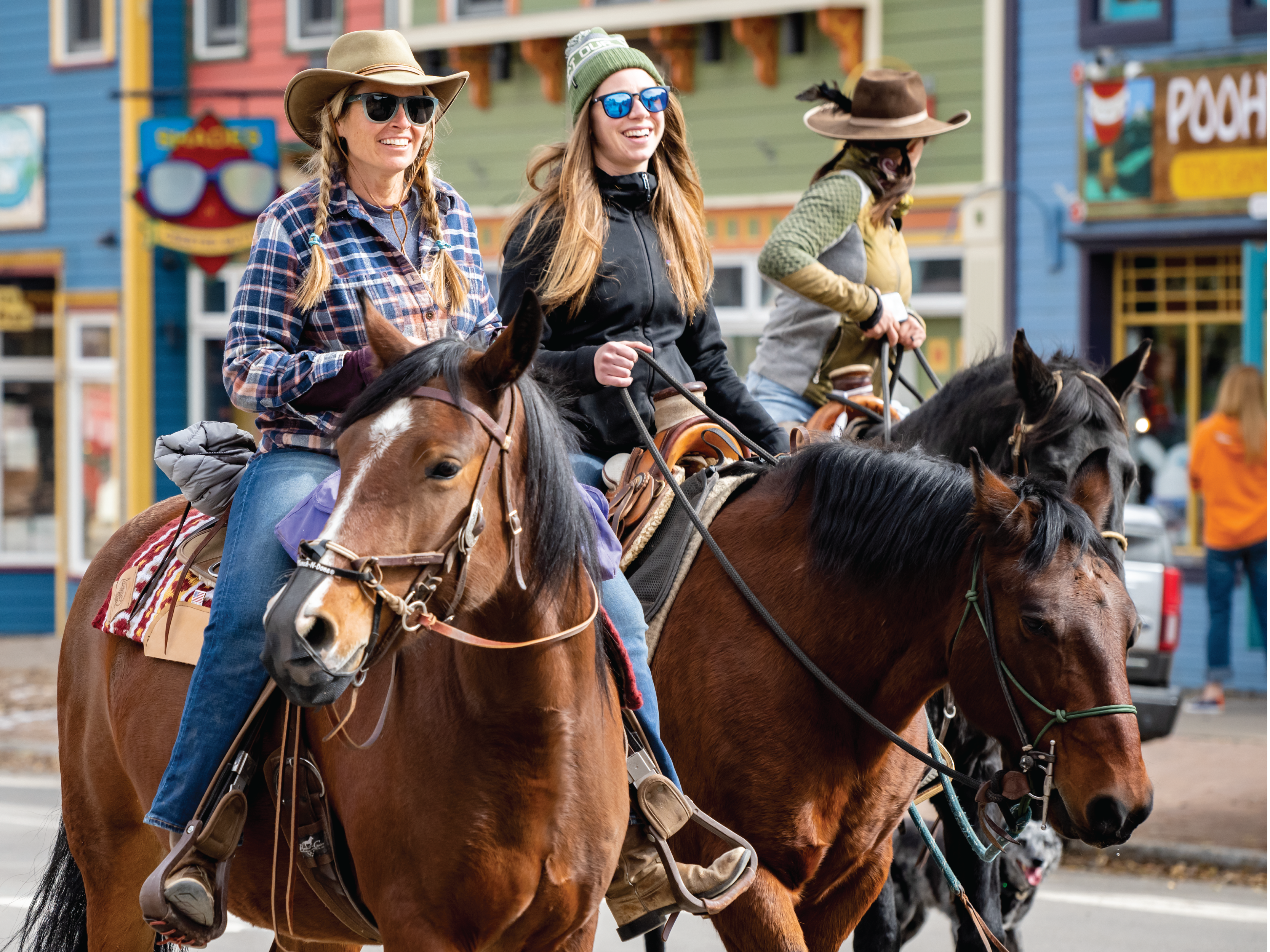 people riding on horses