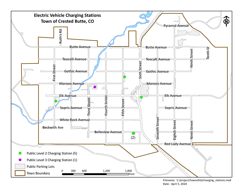 Map of electric vehicle charging stations in the Town of Crested Butte, Colorado. It shows streets, public parking lots, and the town boundary. There are five Public Level 2 Charging Stations marked with green dots located near Sopris Avenue and First Street, Elk Avenue and Fourth Street, Maroon Avenue and Fourth Street, Gothic Avenue and Sixth Street, and Belleview Avenue and Sixth Street (noted with a label '2'). One Public Level 3 Charging Station is marked with a purple square near Maroon Avenue and Thi